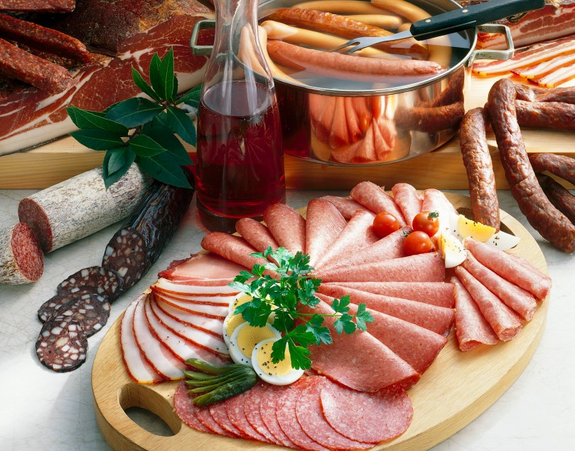 Still life with sausages, ham and bacon